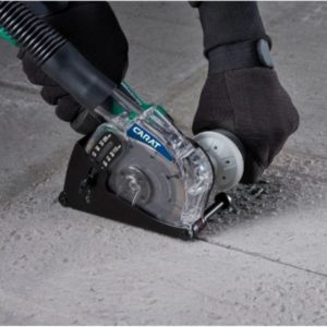 Carat-pölynpoistosarja Ø 125 mm kulmahiomakoneeseen – tehokas ja helposti asennettava suojakuori pölyttömään leikkaamiseen.